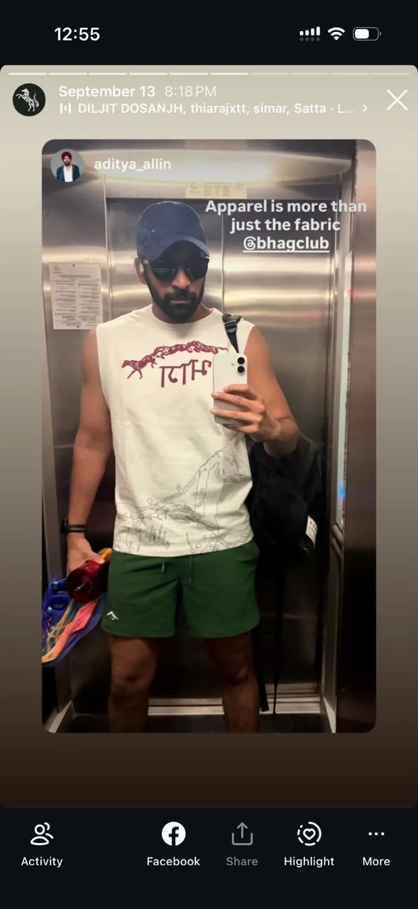 A member's lift mirror selfie in the भाग Muscle Tank, captioned 'Apparel is more than just the fabric @bhagclub'
