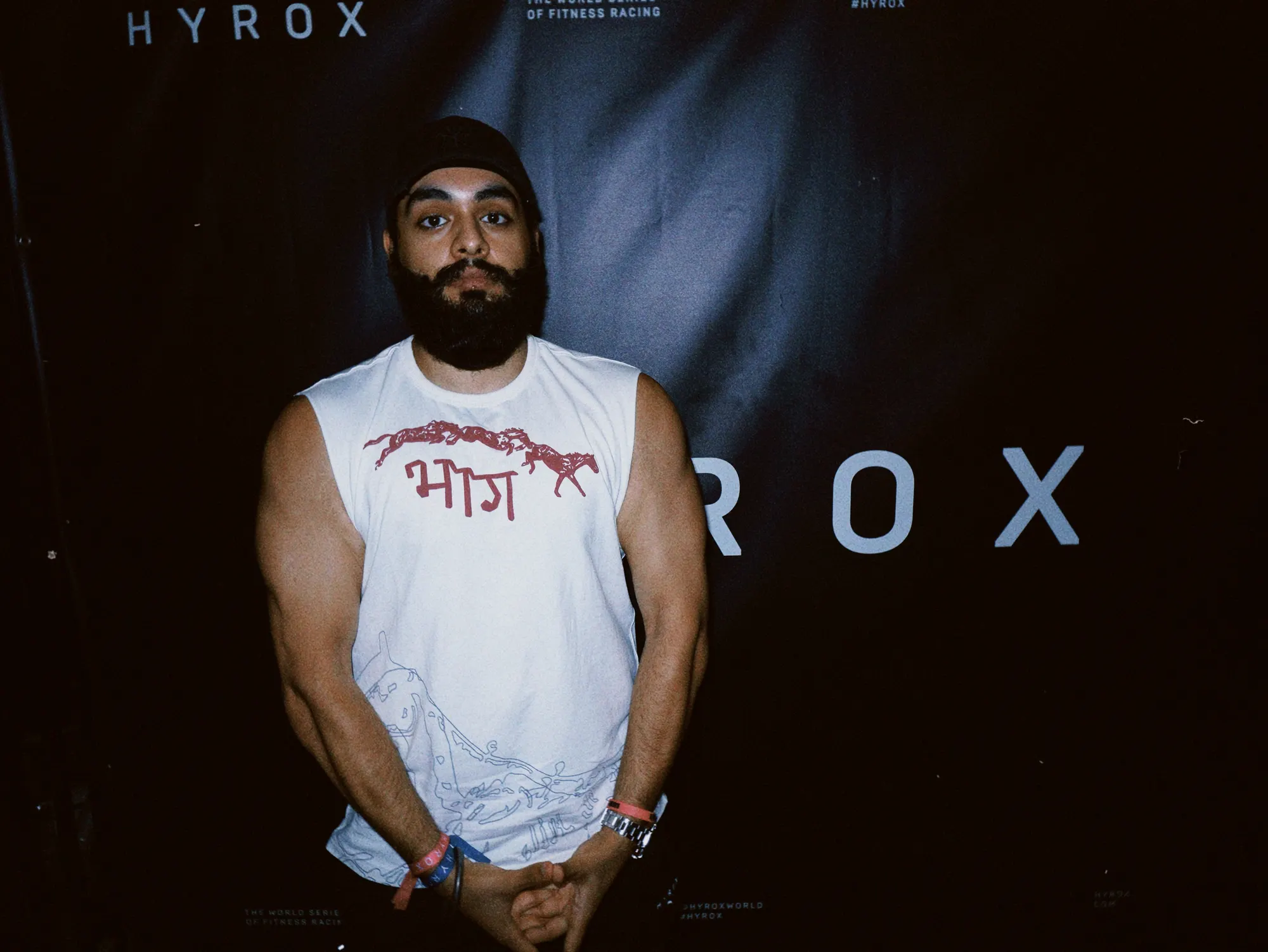भाग Muscle Tank in Bone, chest print, worn at HYROX